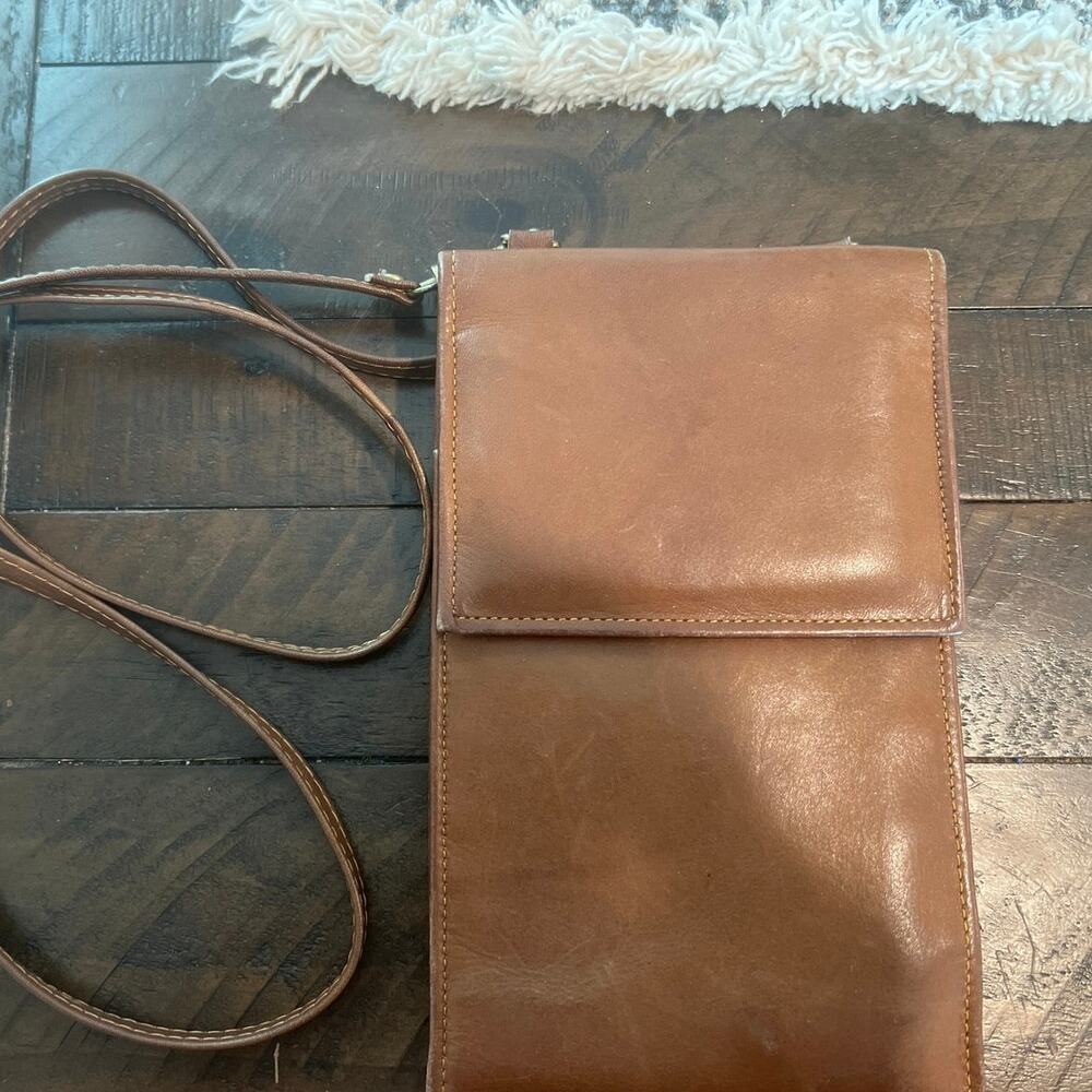 Rolf’s Cowhide leather crossbody wallet bag